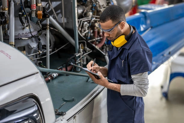 Maintenance Mechanic working on a production line machine.
