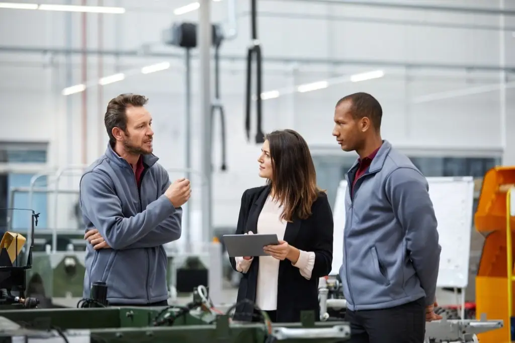 Manufacturing Management discussing changes to a production line.